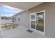 Covered patio with seating and a sliding glass door leading into the home at 3333 Sandy Meadows Dr, Fuquay Varina, NC 27526