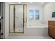 Well-maintained bathroom featuring a shower, a soaking tub and great light at 3648 Praed Pl, Fuquay Varina, NC 27526