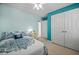 Bedroom featuring bright blue walls, carpet and closet at 3648 Praed Pl, Fuquay Varina, NC 27526