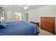Relaxing bedroom with a glimpse into the bathroom, offering a calm and inviting space at 3648 Praed Pl, Fuquay Varina, NC 27526