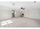 Large bonus room featuring neutral carpet, storage, and access to the staircase at 3648 Praed Pl, Fuquay Varina, NC 27526