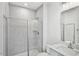 Bathroom featuring a glass-enclosed shower with modern tile and vanity at 4501 Mint Leaf Ln, Raleigh, NC 27612