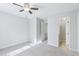 Neutral bedroom with carpet flooring and a door leading to hallway or bathroom at 4523 Hamptonshire Dr, Raleigh, NC 27613