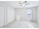 Neutral bedroom with two large closets, bright window and carpet at 4523 Hamptonshire Dr, Raleigh, NC 27613