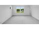 Large bedroom with plush carpet, multiple windows and neutral paint at 46 Shay St, Angier, NC 27501