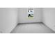 Clean, bright bedroom has carpeting, neutral walls, and natural light at 46 Shay St, Angier, NC 27501