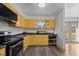 Bright kitchen features a modern countertop and stainless steel appliances at 47 Angela Way, Durham, NC 27703