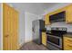 This updated kitchen features modern appliances and stylish cabinets at 47 Angela Way, Durham, NC 27703