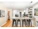 Kitchen featuring granite countertops, stainless steel appliances, and modern white cabinetry at 5 Bridgeport Dr, Durham, NC 27713