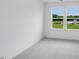 This neutral bedroom is a blank slate, ready for customization to the buyer's taste at 52 Shay St, Angier, NC 27501