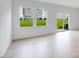 Bright living room with slider to the backyard and an abundance of natural light at 52 Shay St, Angier, NC 27501