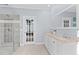 Stylish bathroom featuring glass shower, double vanity, and neutral color palette at 5317 Chimney Swift Dr, Wake Forest, NC 27587