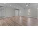 Spacious bedroom featuring hardwood floors, neutral walls, recessed lighting, ceiling fan, and closet at 5317 Chimney Swift Dr, Wake Forest, NC 27587