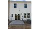 Rear exterior view of a home with a patio and sliding glass doors for easy outdoor access at 58 Shay St, Angier, NC 27501