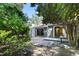 Lush backyard features a patio, privacy fence, and a birdbath, perfect for outdoor relaxing at 5840 Branchwood Rd, Raleigh, NC 27609