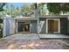 Backyard features a patio, privacy fence, and sliding glass doors for indoor/outdoor living at 5840 Branchwood Rd, Raleigh, NC 27609