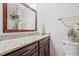 Bathroom featuring granite countertop vanity with mirror and pendant light at 5840 Branchwood Rd, Raleigh, NC 27609