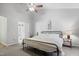 Cozy bedroom featuring plush carpet, neutral walls, and lots of natural light at 5840 Branchwood Rd, Raleigh, NC 27609