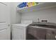This laundry room has a washing machine and dryer at 5840 Branchwood Rd, Raleigh, NC 27609
