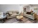 Open living room featuring wood floors and comfortable seating arrangements for entertaining guests at 5840 Branchwood Rd, Raleigh, NC 27609