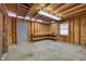 Interior of a shed featuring wood walls and ceiling and a concrete floor at 6605 Pearces Rd, Louisburg, NC 27549