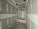 Unfinished bathroom with a new white tub shower at 82 Asher Pointe Way, Benson, NC 27504