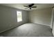 Serene bedroom with neutral walls and plush carpeting at 82 Asher Pointe Way, Benson, NC 27504