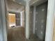 Hallway under construction featuring raw walls and concrete floors, awaiting finishing touches and design at 82 Asher Pointe Way, Benson, NC 27504