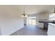 Eat-in kitchen featuring granite countertops, stainless appliances, and sliding glass door at 82 Asher Pointe Way, Benson, NC 27504