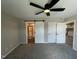 Spacious main bedroom featuring neutral walls, carpeted floors, and an ensuite bathroom at 82 Asher Pointe Way, Benson, NC 27504