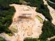 An aerial view showing a construction site with land being prepared for new home development at 8717 Wardle Ct, Raleigh, NC 27616