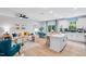 Open-concept living space with kitchen, dining, and Gathering room creating a welcoming atmosphere at 8717 Wardle Ct, Raleigh, NC 27616