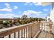 Balcony offers stunning views of manicured landscaping and distant buildings at 1018 Salt Glaze Ln, Cary, NC 27519