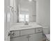 A modern bathroom with a vanity and a mirror at 1018 Salt Glaze Ln, Cary, NC 27519