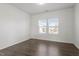 Well-lit bedroom with large windows, neutral walls, and ample closet space for comfort at 1018 Salt Glaze Ln, Cary, NC 27519