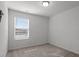 Inviting bedroom featuring soft carpet, ample lighting, and a serene setting at 1018 Salt Glaze Ln, Cary, NC 27519