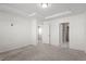 Comfortable bedroom with neutral carpet, recessed lighting, and doors to closet and bath at 1018 Salt Glaze Ln, Cary, NC 27519