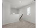 Neutral hallway with carpet and window at 1018 Salt Glaze Ln, Cary, NC 27519