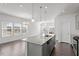 Beautiful kitchen with granite countertops, stainless steel appliances and plenty of sunlight at 1018 Salt Glaze Ln, Cary, NC 27519