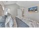 Bedroom showcases neutral tones, natural light, and a view of the ensuite bathroom at 104 E Seve Ct, Morrisville, NC 27560