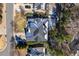 Birds eye view of gray shingled roof, green lawn, and surrounding manicured neighborhood at 113 Witheridge Ct, Apex, NC 27502