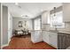 Bright, updated kitchen with a breakfast bar and open view to a cozy seating area at 115 Ripplewater Ln, Cary, NC 27518