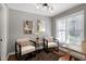 Cozy sitting area featuring comfortable chairs and natural light at 115 Ripplewater Ln, Cary, NC 27518