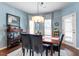 Dining room has hardwood floors, lots of light from the windows, and table with four chairs at 127 Lakemont Dr, Clayton, NC 27520