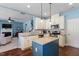 Well-equipped kitchen opens to the living area, with granite countertops and stainless appliances at 127 Lakemont Dr, Clayton, NC 27520