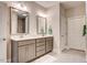 Serene bathroom featuring a double vanity, granite countertops, and modern fixtures at 129 Oban Dr, Homesite 150, Sanford, NC 27330
