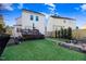 Spacious backyard features a wooden deck, well-manicured lawn, and mature landscaping. The perfect outdoor retreat at 13 Piccadilly Ct, Durham, NC 27713