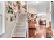 Inviting foyer with hardwood floors and a staircase leading to the upper level at 13 Piccadilly Ct, Durham, NC 27713