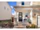 Charming front porch with stone columns, a welcome sign, and a cozy sitting area at 13 Piccadilly Ct, Durham, NC 27713