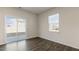 Bright living room with sliding glass doors to the backyard at 132 Paper Birch Way, Fuquay Varina, NC 27526